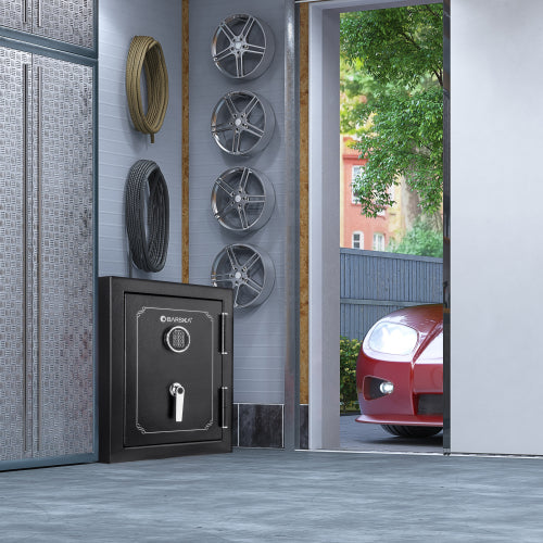 BASALT S fireproof safe vault, installed in a garage beside a wheel display wall