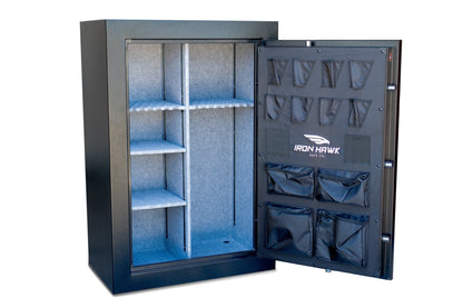 40-gun safe interior, empty, showing adjustable shelving and slotted gun racks