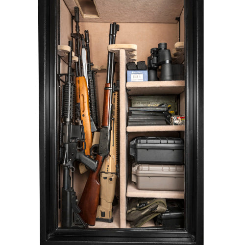 BASALT 30 fireproof gun safe, interior view packed with long guns, optics and ammunition boxes