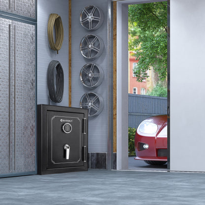 BASALT S fireproof safe vault, installed in a garage beside a wheel display wall
