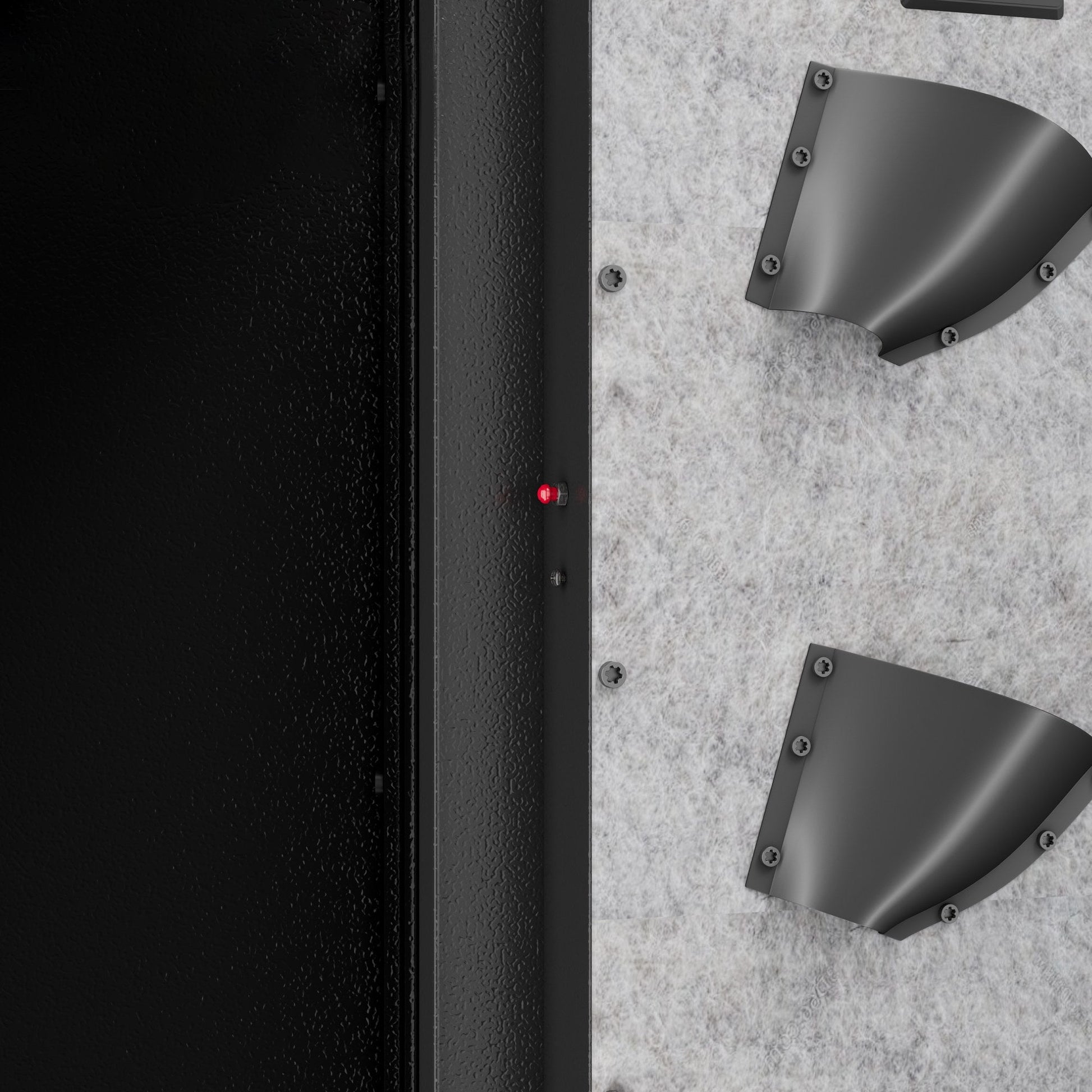 Two handgun holsters mounted on the inside of the safe door