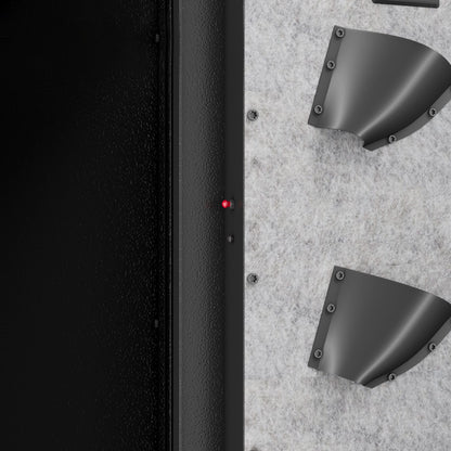 Two handgun holsters mounted on the inside of the safe door