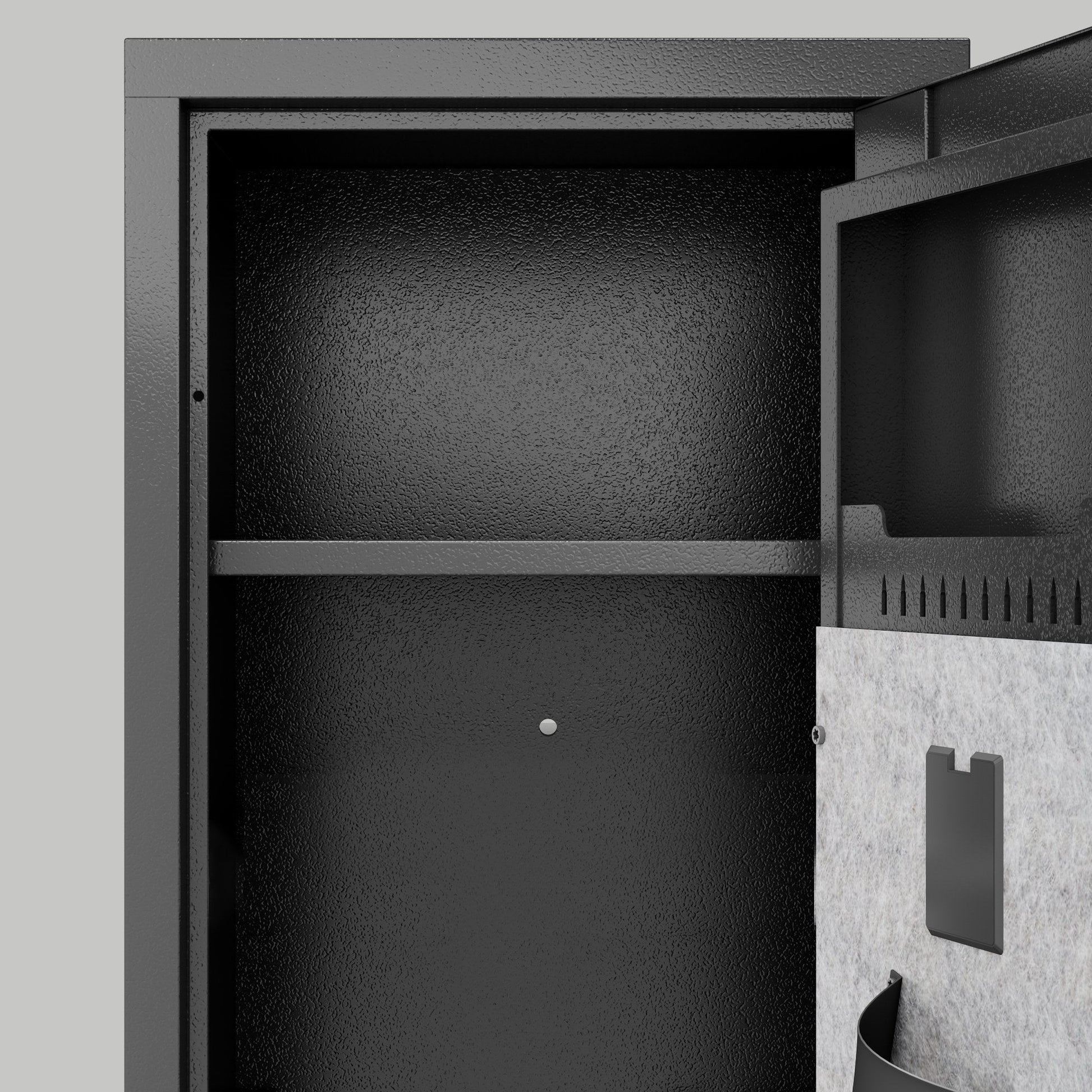 Empty interior showing the barrel retaining bar and carpeted lining