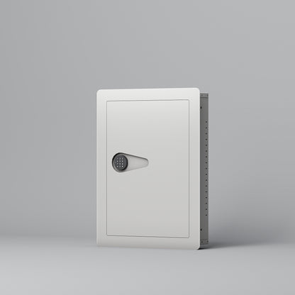 SLATE S in-wall safe in white, closed, front three-quarter view from the right of the small in-wall safe